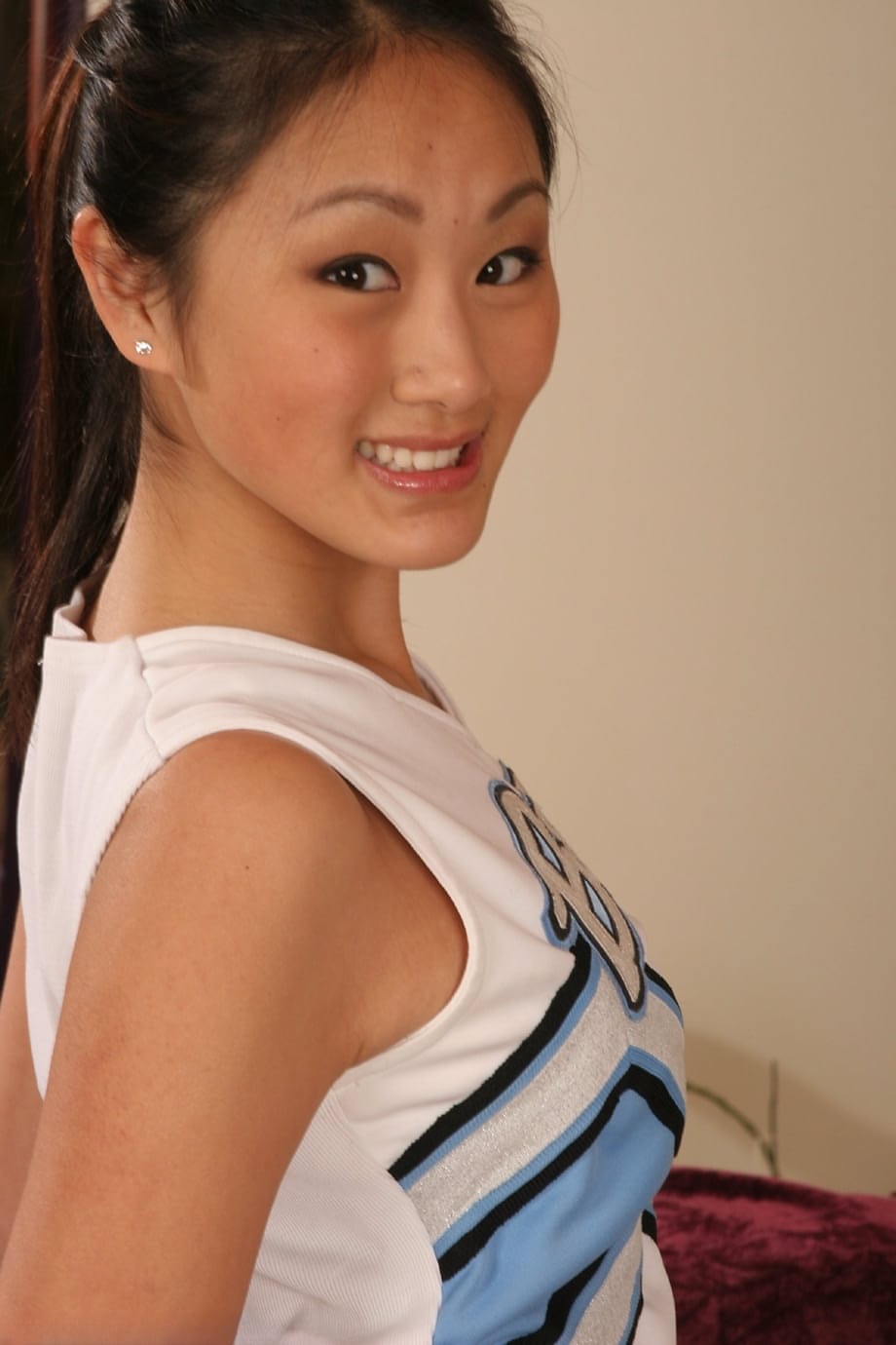 Asian cheerleader Evelyn Lin spreads tight fuck holes exposing her toned body - 2