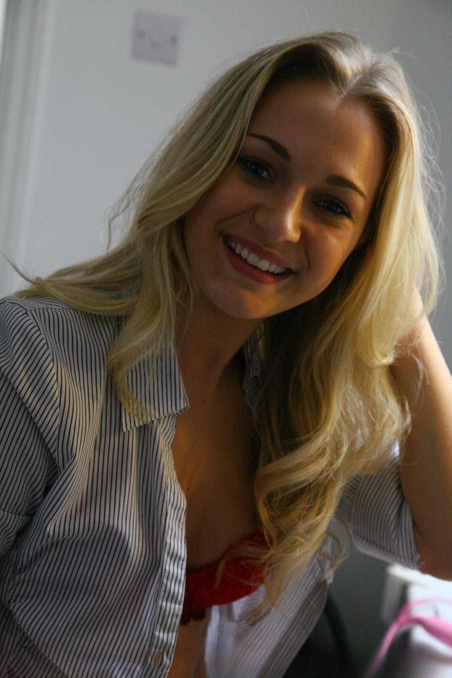 Jo exposing her perfect body while stripping out of exotic lingerie during passionate photoshoot - 18