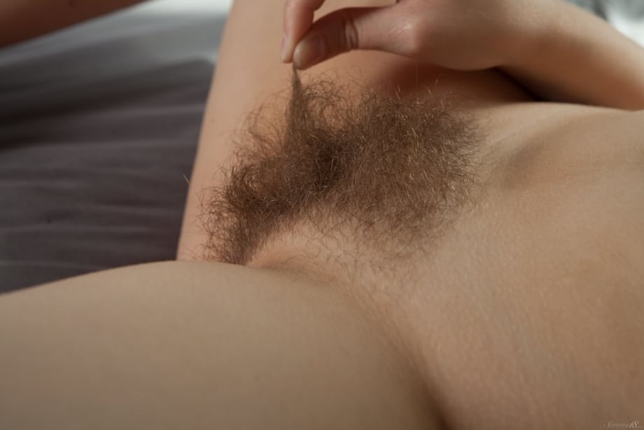 Alice gets completely naked showing her thick ass and hairy bush - 13