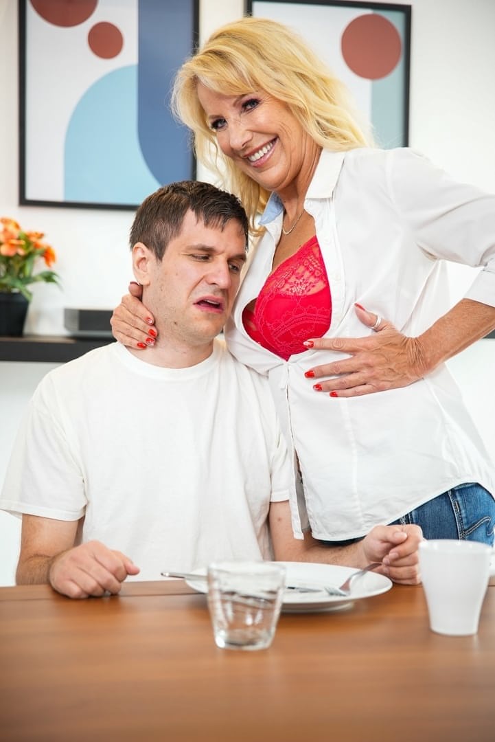 Bianca T strips slow showing huge breasts behind nerdy glasses as hot blonde mom - 1