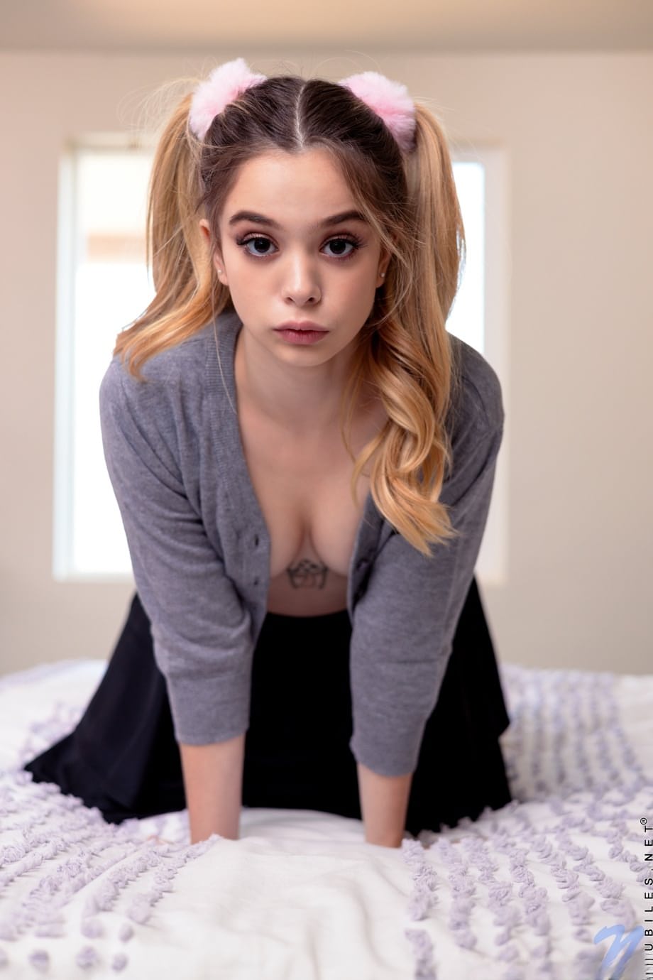 Little pigtailed schoolgirl Molly Little undresses and plays with her muff