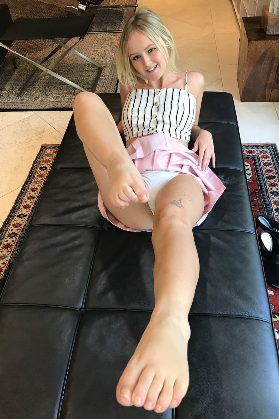 Natalia Queen teasing her bare shaved pink slit in sultry close-up - 12