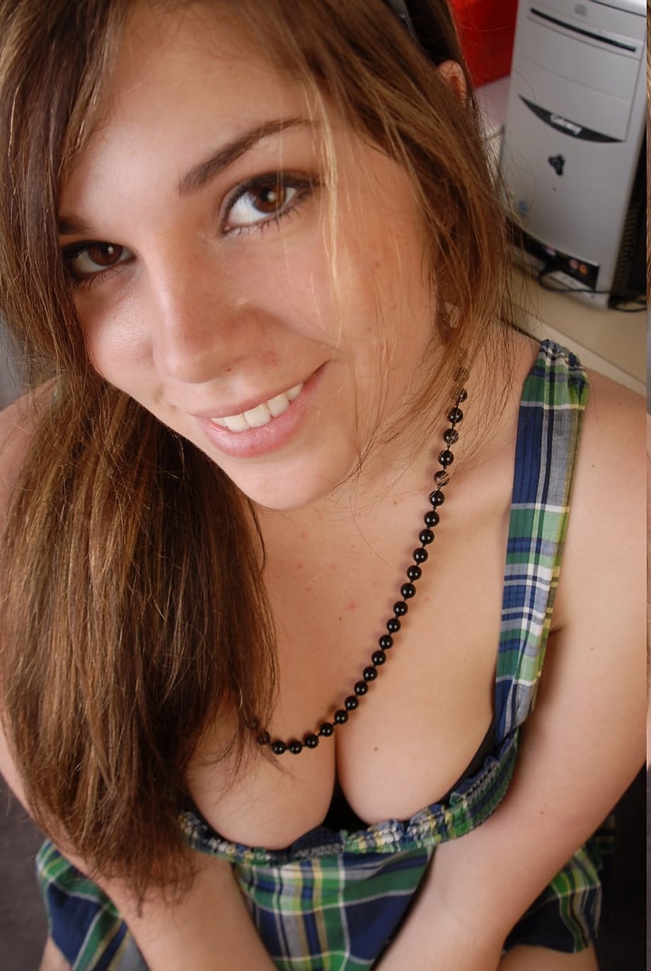 Amateur girl Marley Mason displays her natural tits before showing her bush
