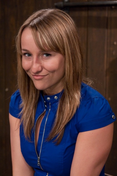 Cute American Jessie Cox gets bound to a metal construction and toyed