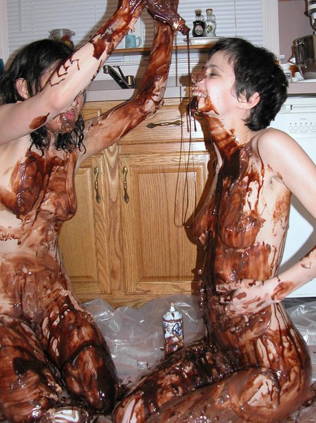 Roxanne and her playful lesbian lover sensually coat bodies in silky chocolate desire - 14