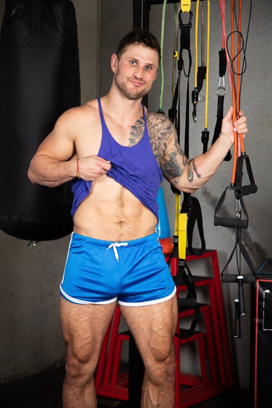 Hot gay Aiden Langston has a wild threesome with muscular men at the gym