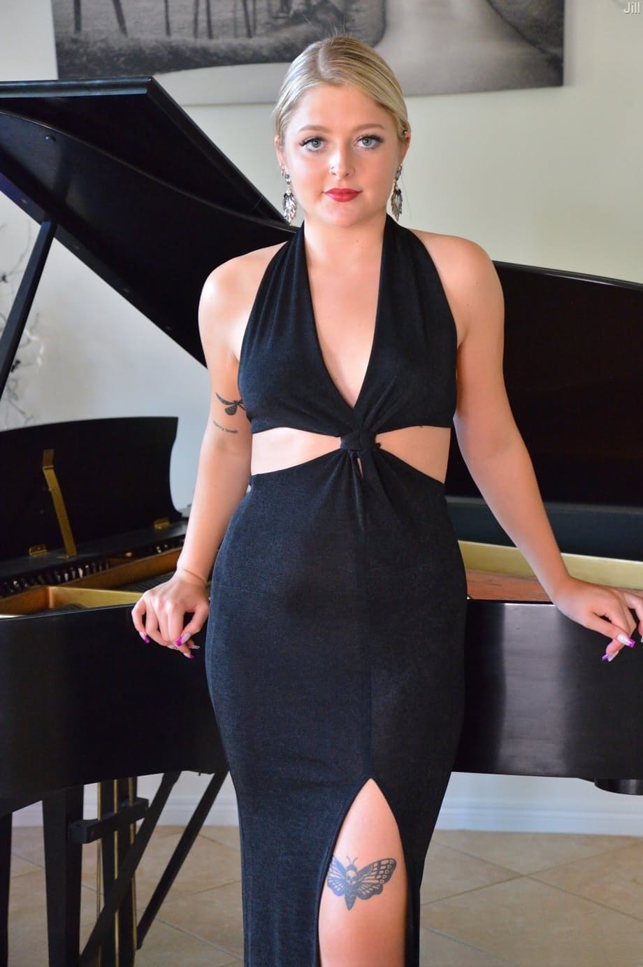Naked Jill Taylor pleasures herself with a thick white dildo on the grand piano - 1