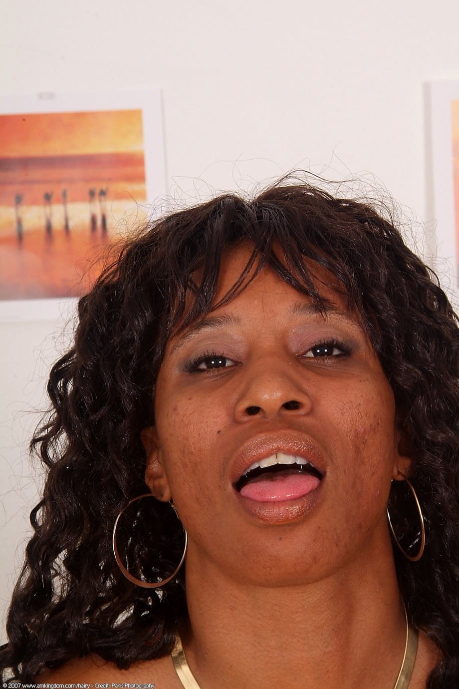 Black solo girl with curly hair shows her natural pussy while masturbating