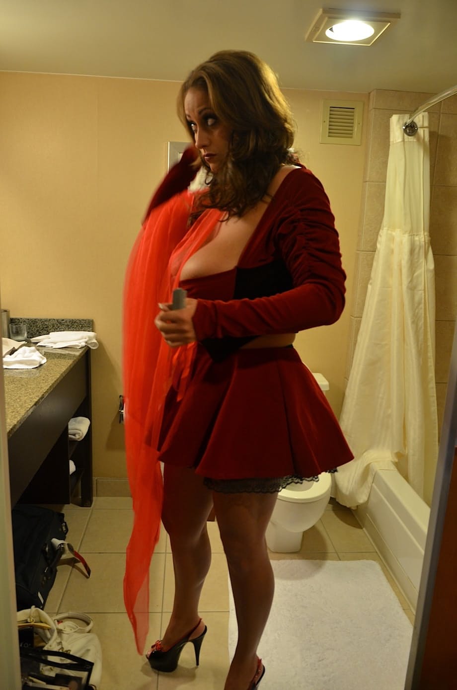 Busty MILF pornstar Eva Notty strips naked in teasing Little Red Riding Hood lingerie - 9