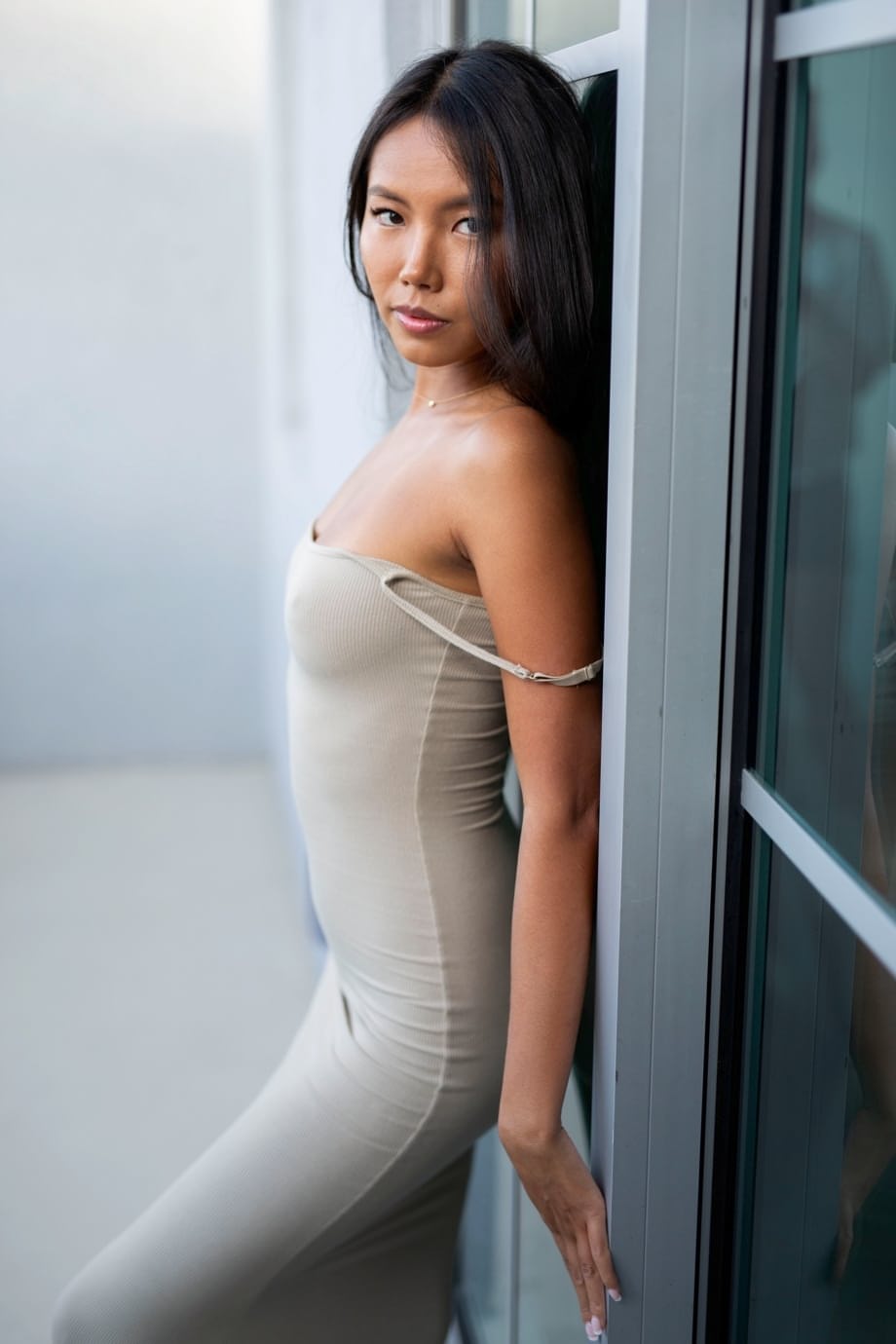 Busty Vivian gets completely naked and shows off her gorgeous sun-kissed tits - 2