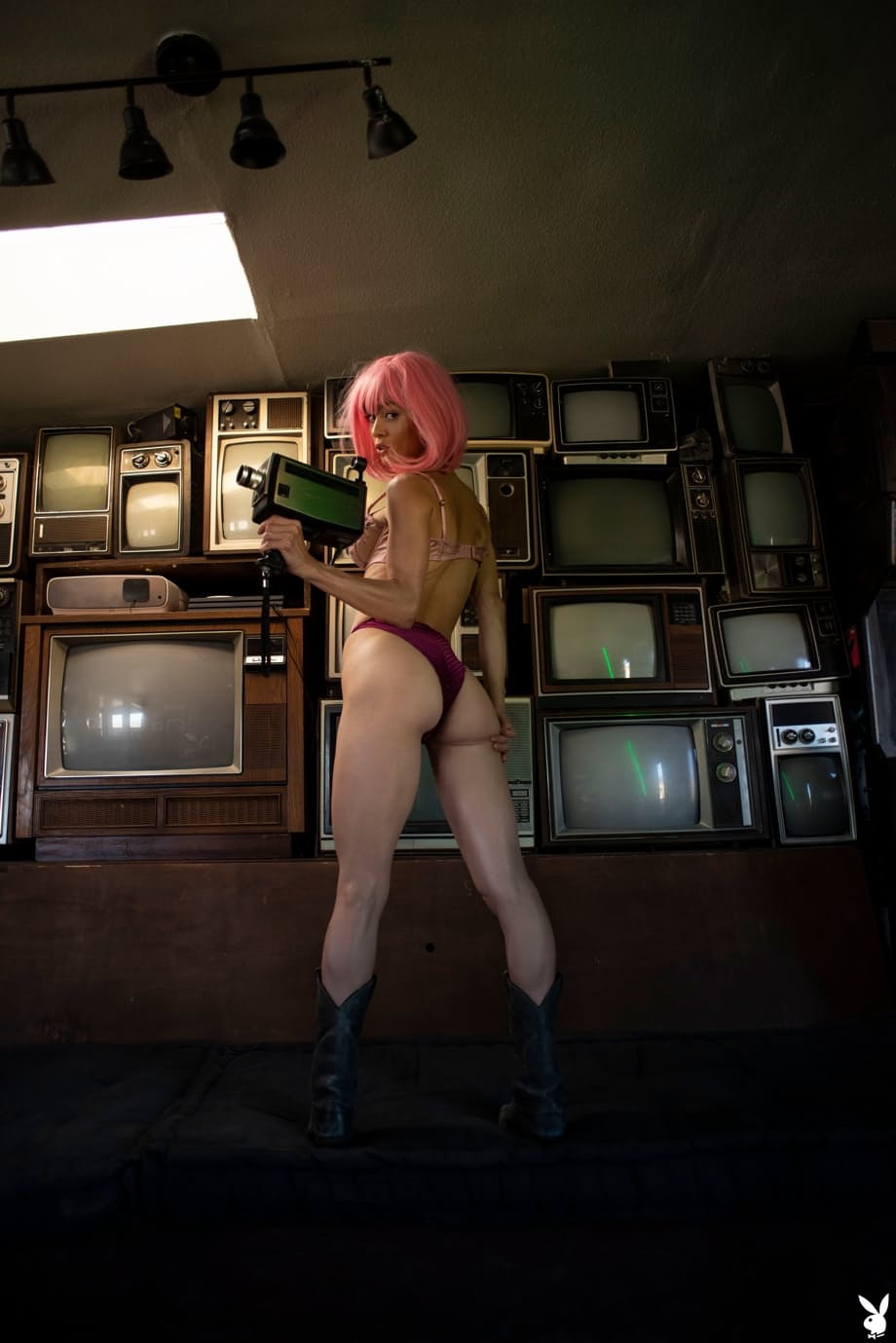 Noel Leon seductive pink hair, luscious big tits stripping and teasing before TVs - 3