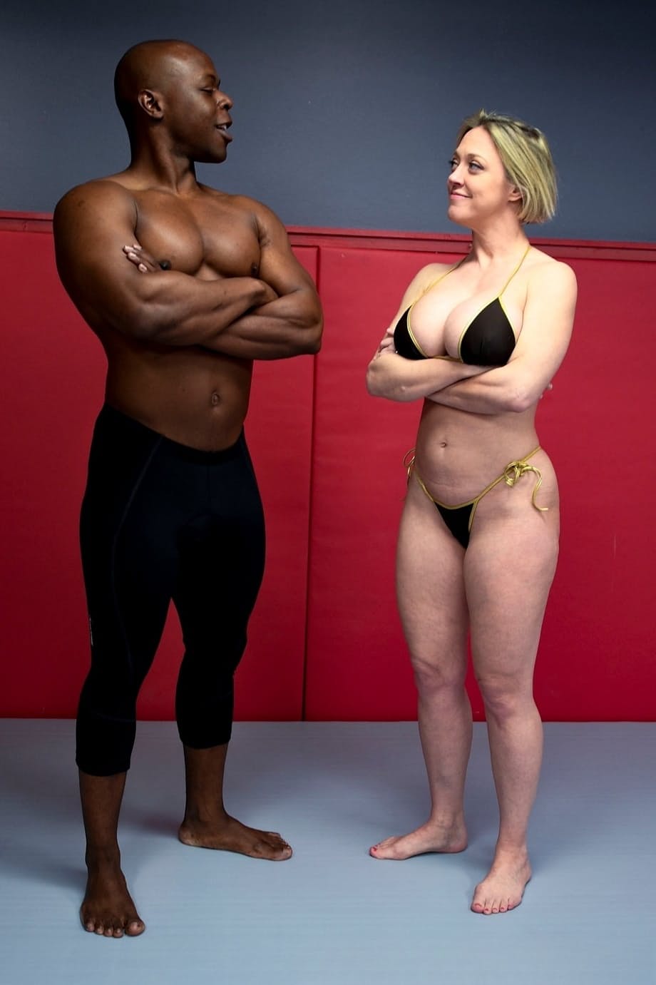Sexy MILF Dee Williams strips and wrestles with a black guy before sex