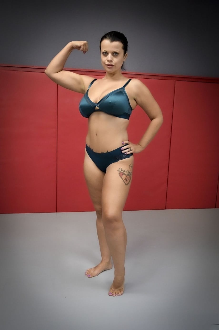 Busty babe Nadia White gets a thorough dicking while wrestling with a man