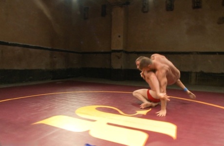 Doug Acre and rival wrestler shed briefs during their sweaty, naked arena bout - 9
