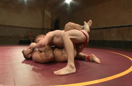 Doug Acre and rival wrestler shed briefs during their sweaty, naked arena bout - 14