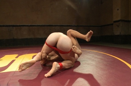 Doug Acre and rival wrestler shed briefs during their sweaty, naked arena bout - 17