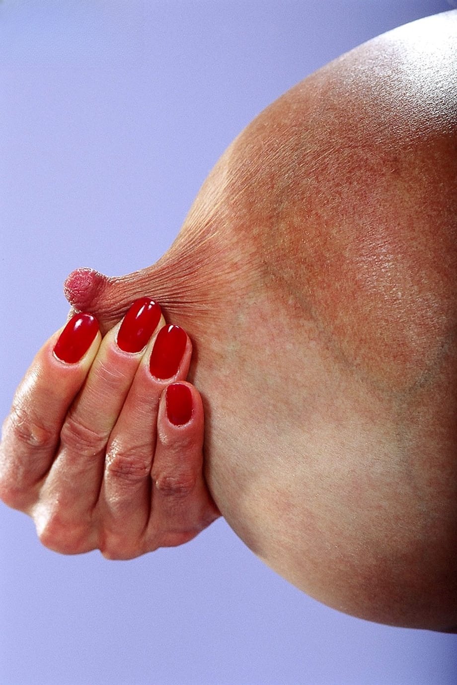 Brunette Asian MILF Minka lets out her monster big tits and toys her holes