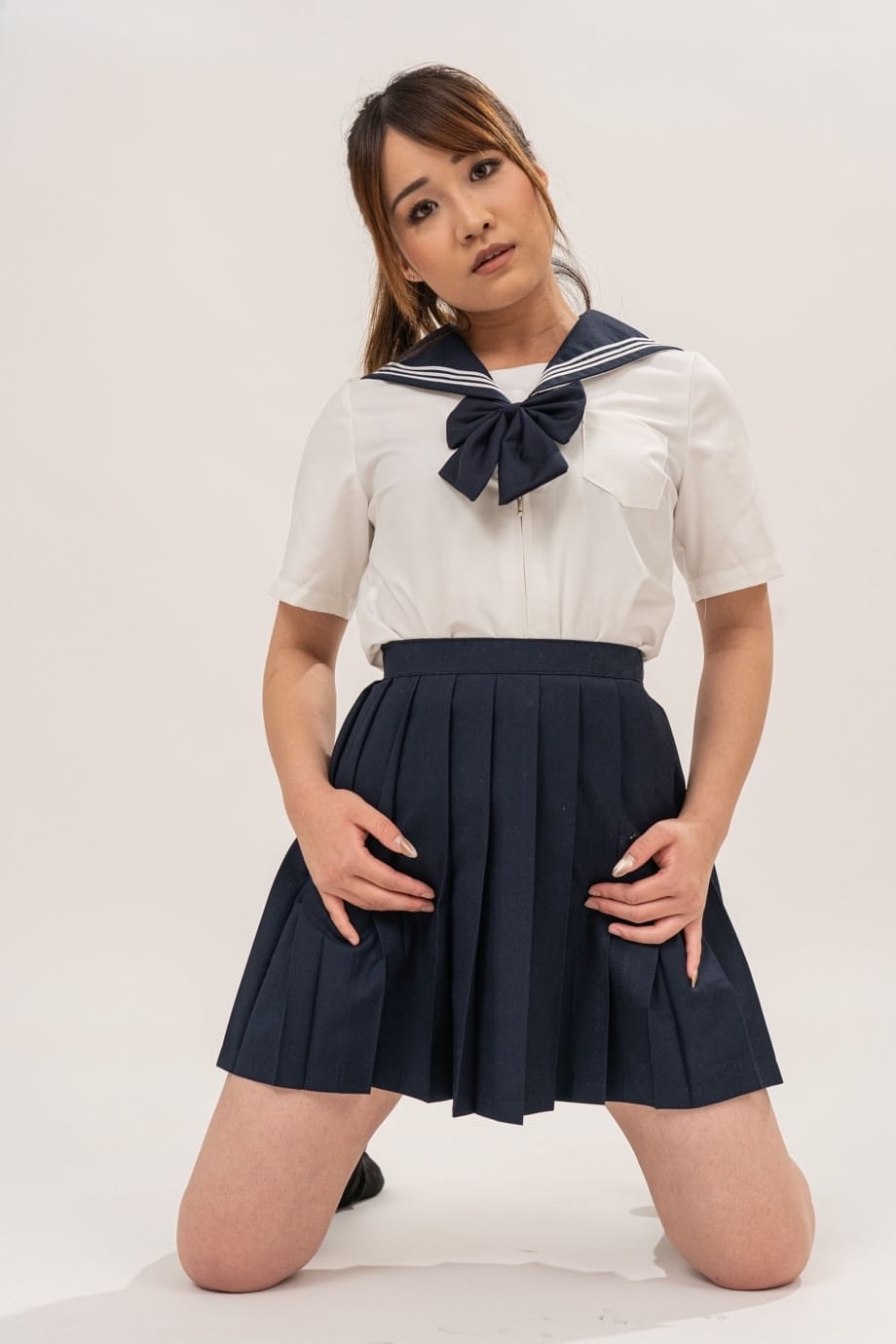 Ciel Tokyo strips her schoolgirl outfit and tempts you utterly bare - 3