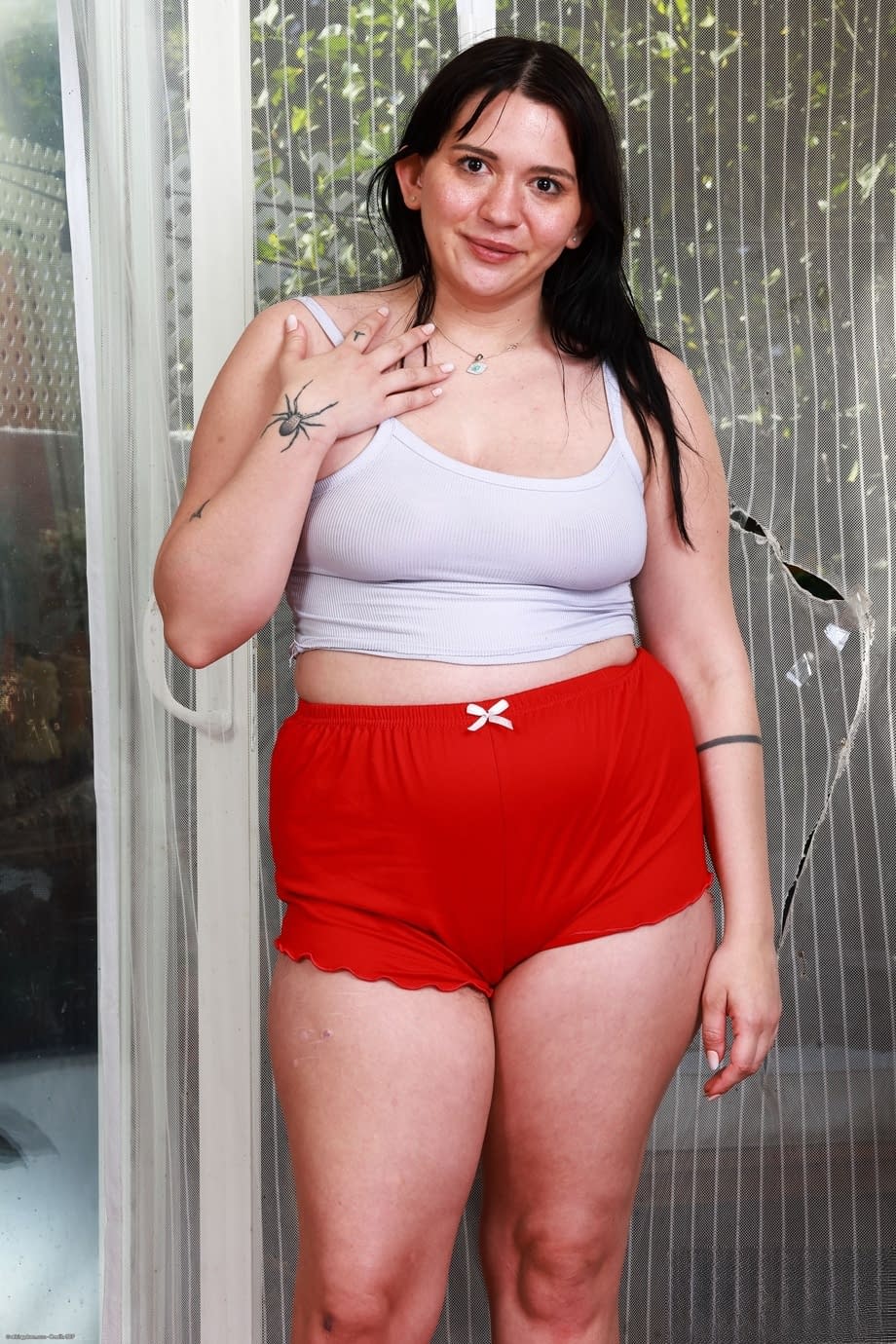 Fat teen Riley Jean holds her big ass before showing her gaped pussy and butt