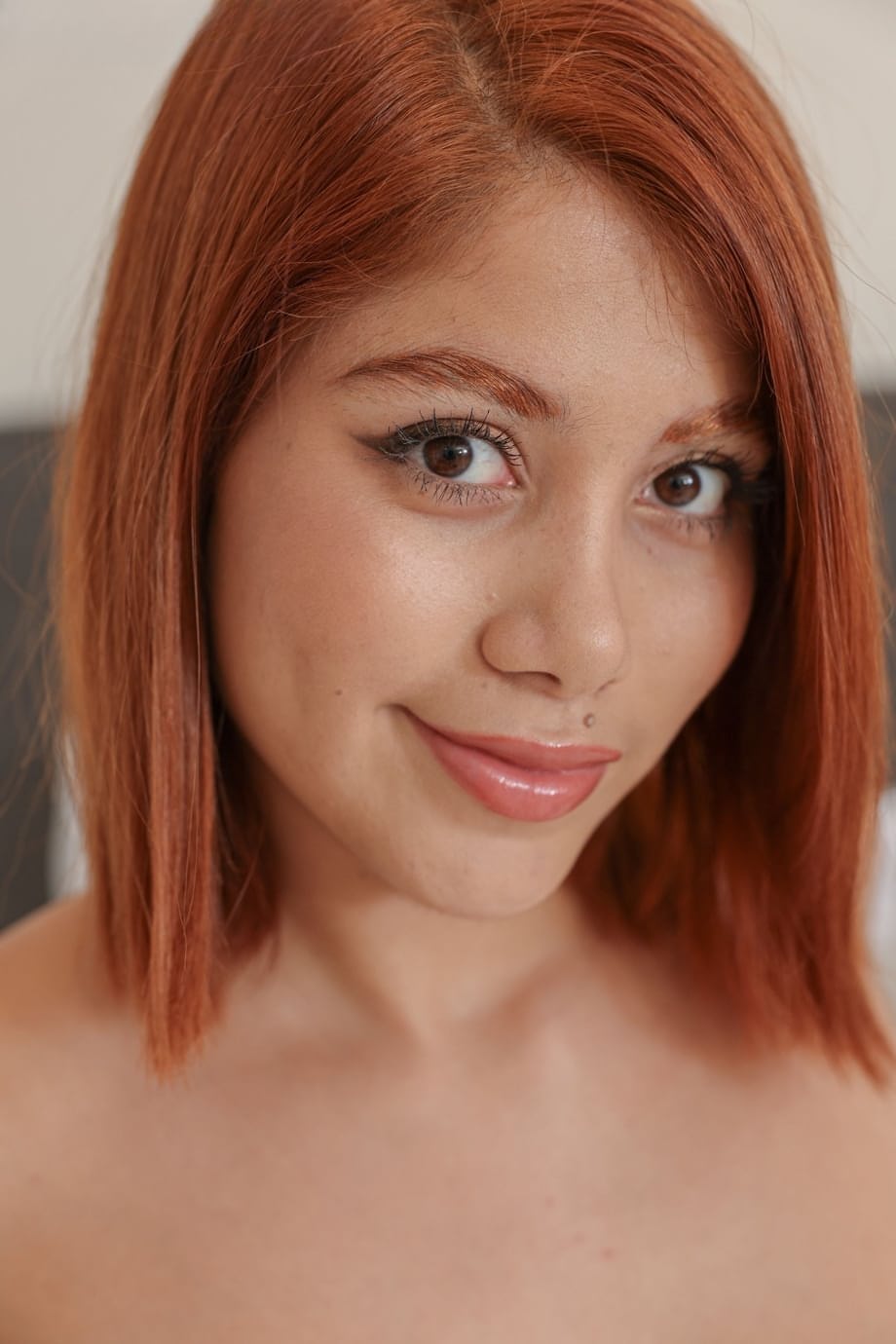 Fiery redhead Marina Gold teases naked on bed with her naughty tongue out - 7