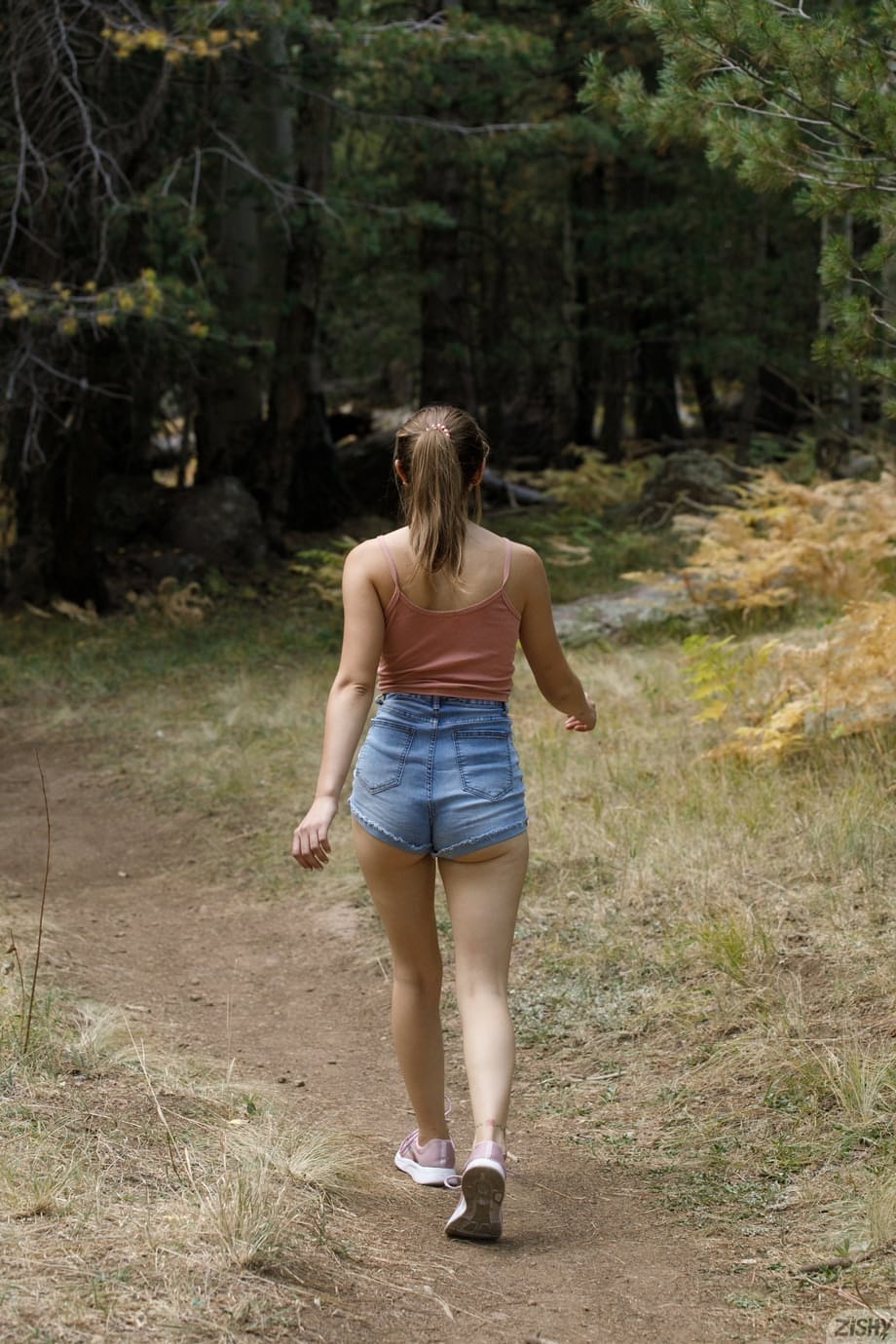 Kay Kay displays her big natural tits outdoors while teasing in the wilderness - 2