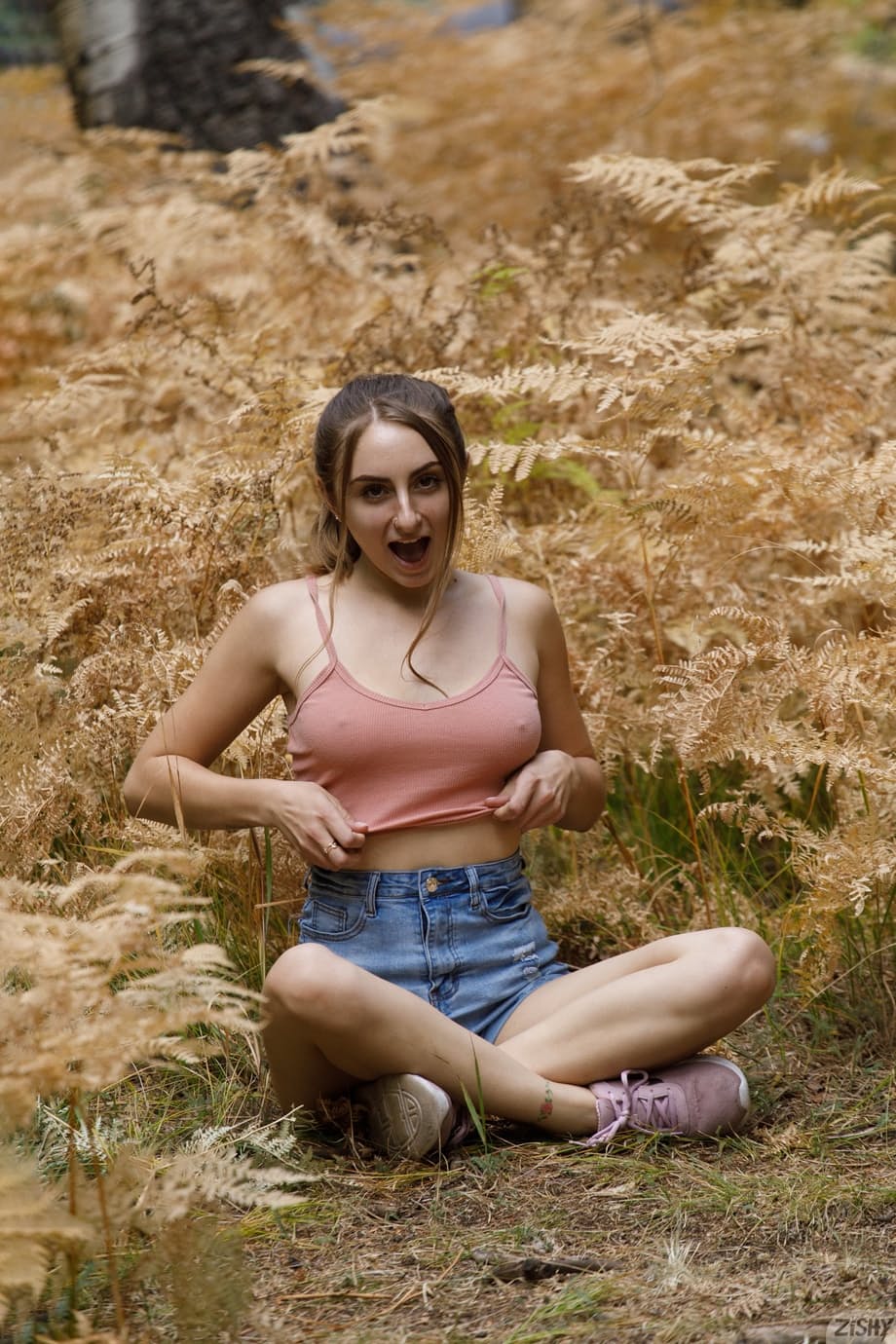 Kay Kay displays her big natural tits outdoors while teasing in the wilderness - 3