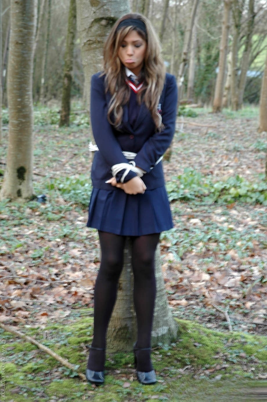 Busty Samantha Buxton bound to tree stripping nude outdoors - 1