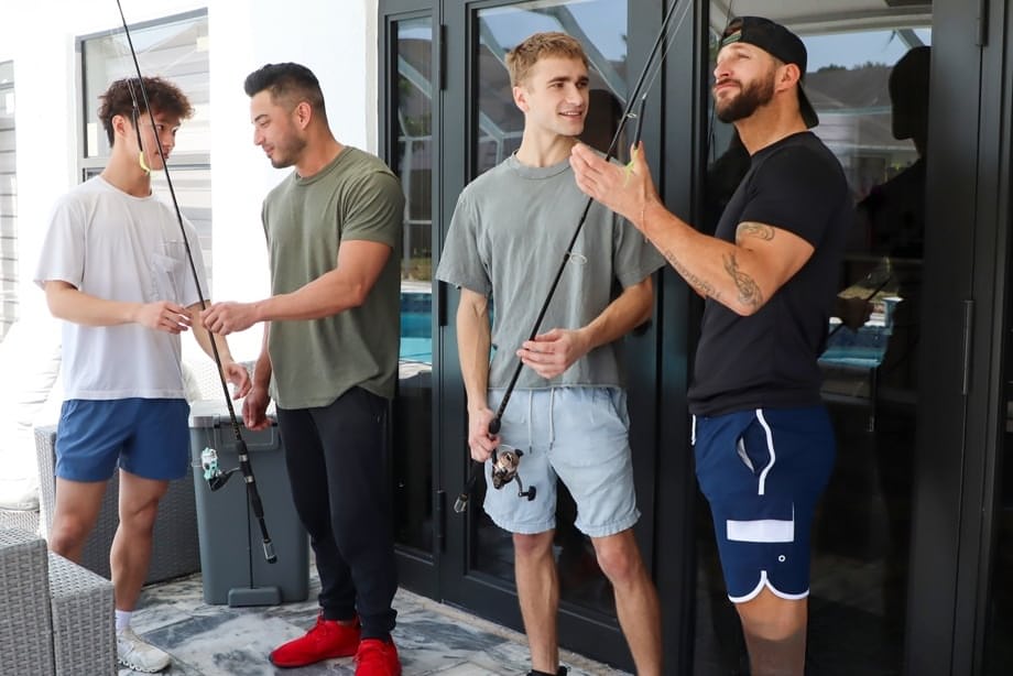 Two younger men have their asses eaten out to begin gay group sex