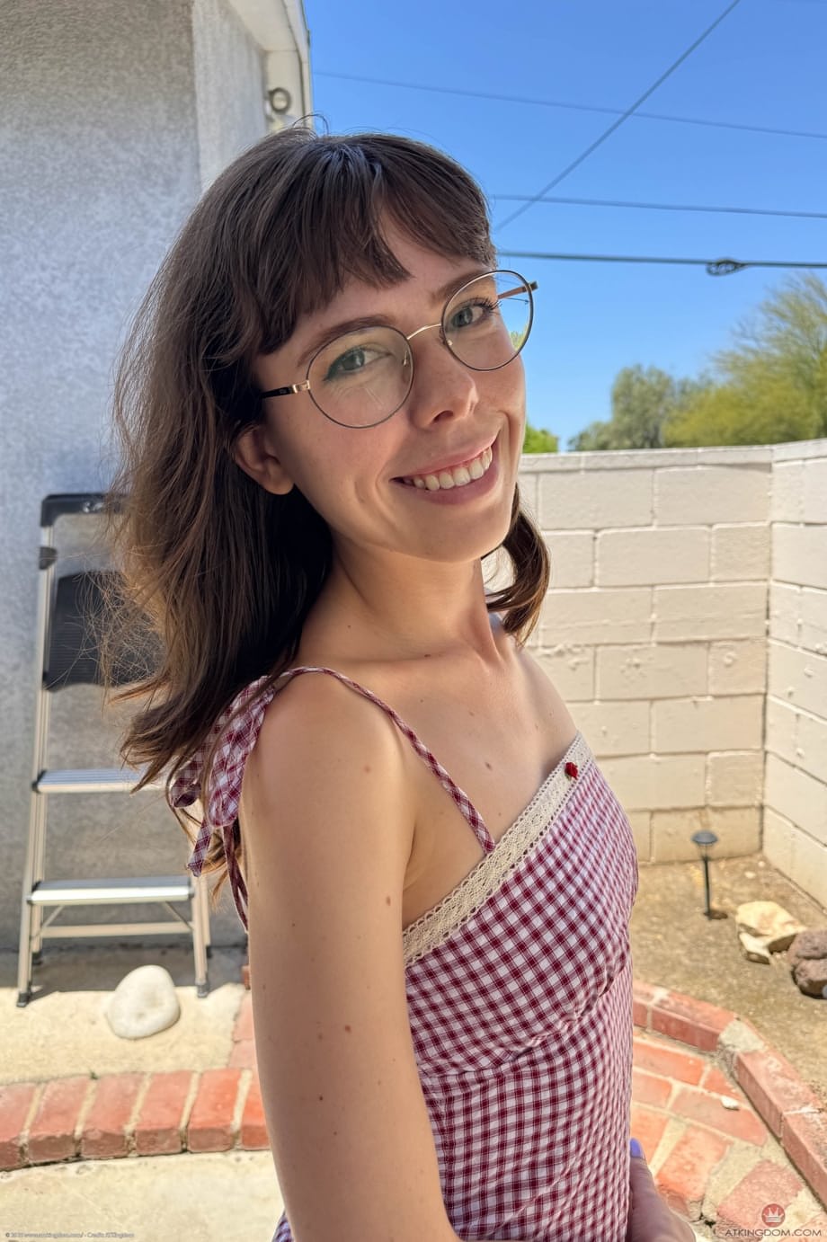Amateur girl Krystal Palmer shows her bare feet before getting totally naked