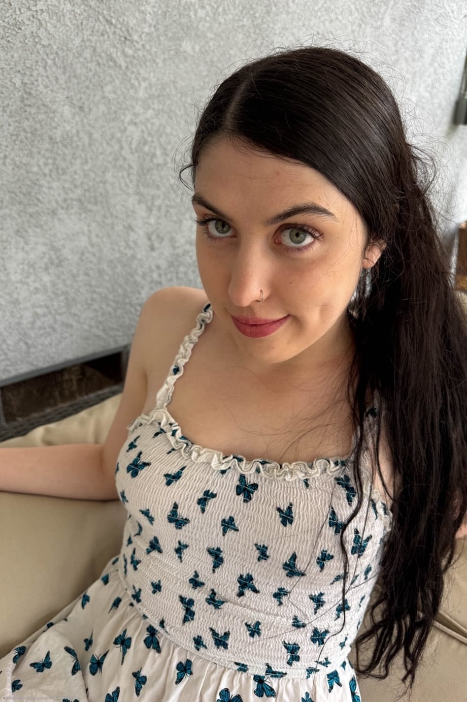 Brunette amateur takes off her dress and slippers for her first nude shoot