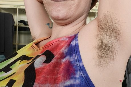 Elizabeth presents her inked curvy body while spreading that hairy wet pussy - 2