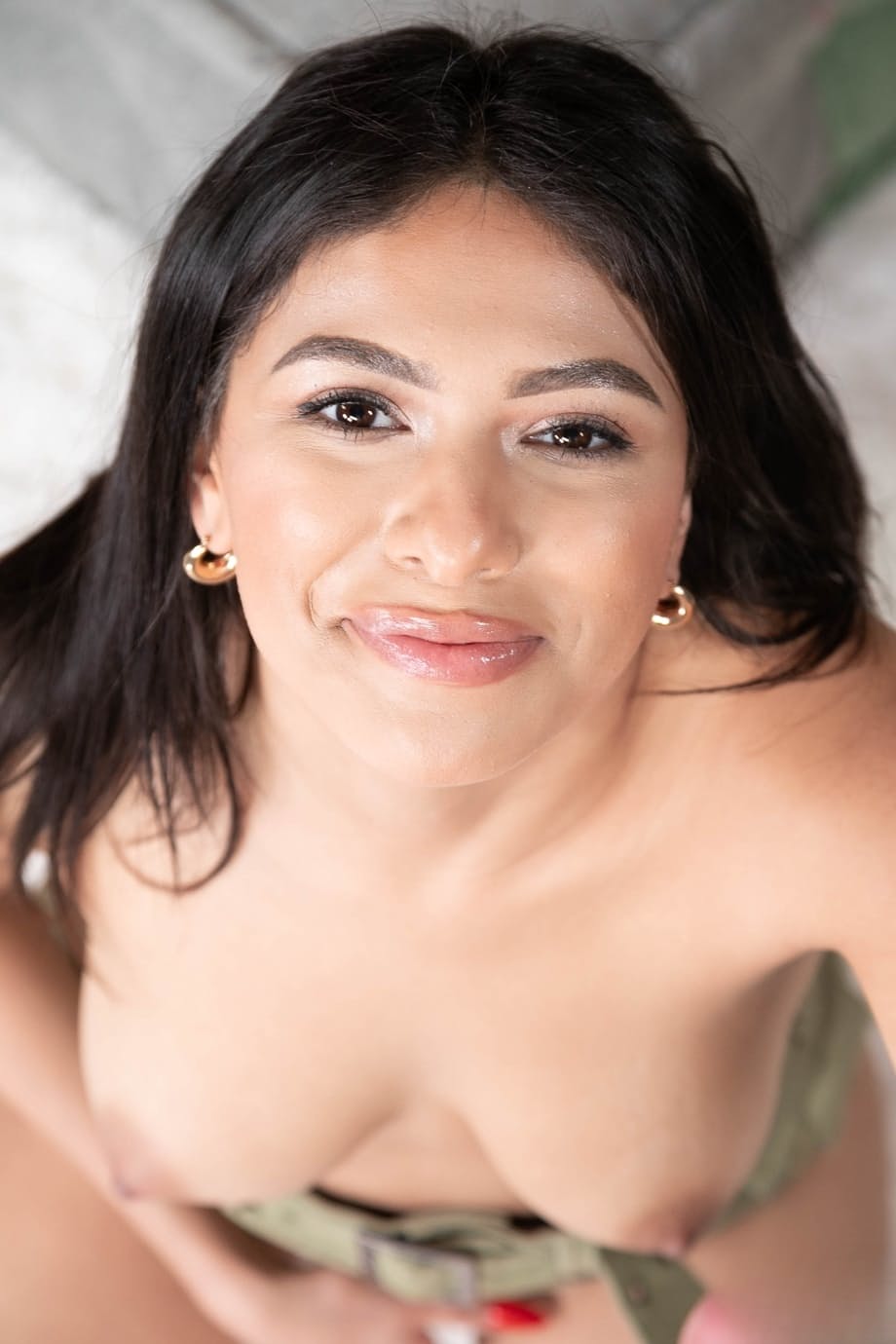 Latina chick Reyna Belle rides a cock while wearing a short skirt