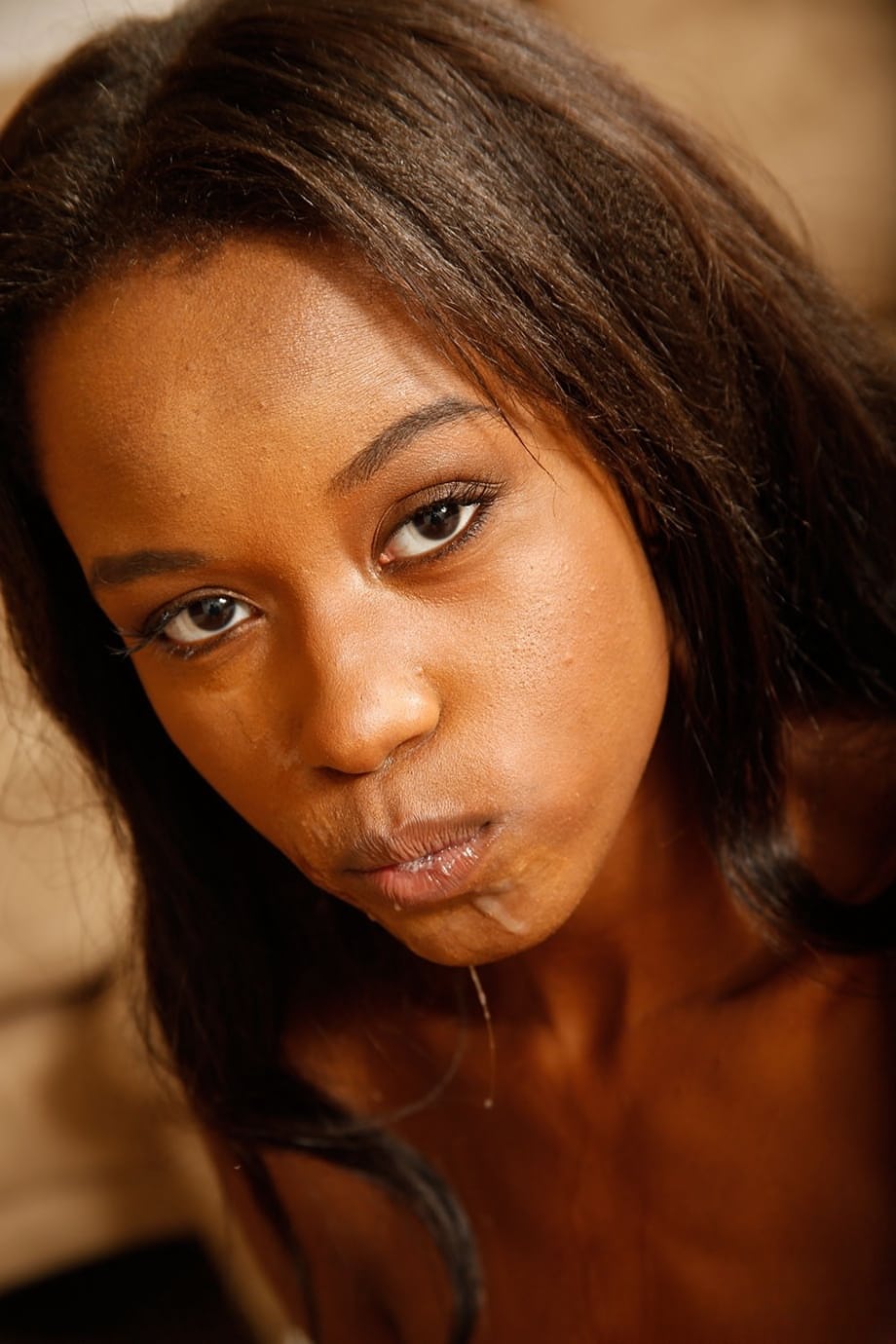 Beautiful black girl Jezabel Vessir strips fully naked and gives a POV blowjob