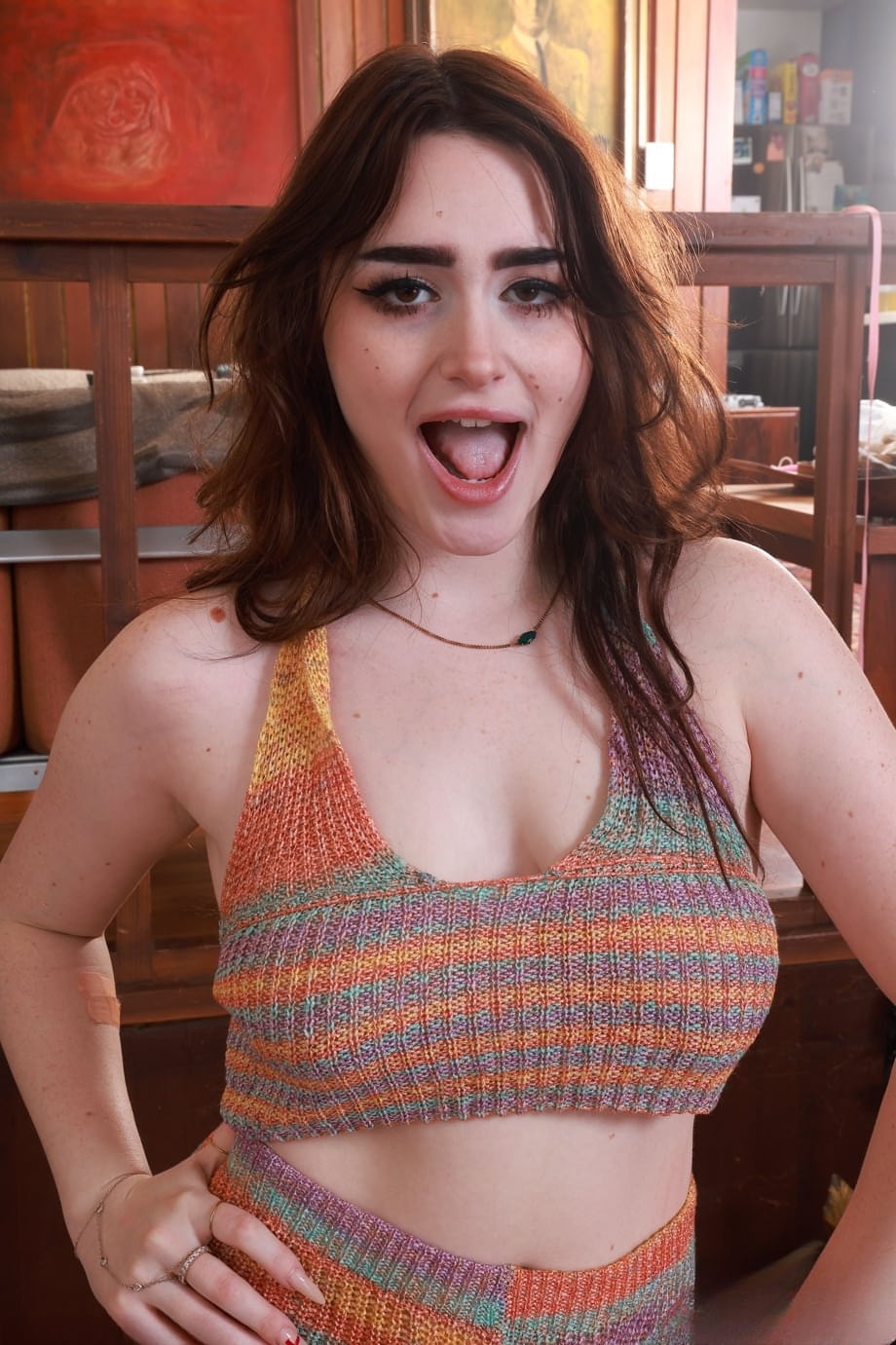 Curvy teen Lilibet Saunders lets out her big tits and flaunts her shaved cunt