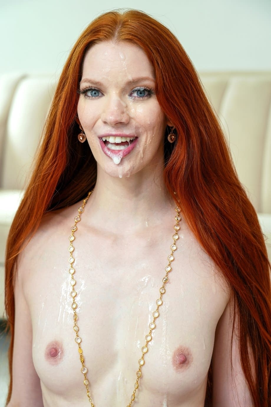 Skinny redhead Erin Everheart does a double penetration with hung men