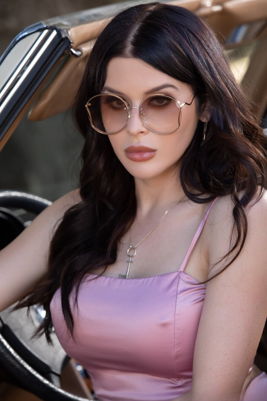 Sultry Renee Olstead strips bare against a car hood deep in woods - 2