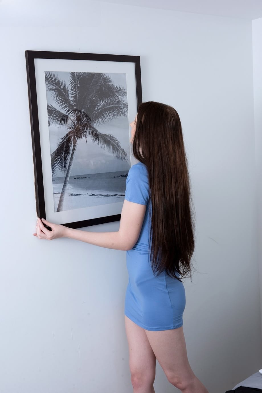 Delicious young Athena Heart strips naked flaunting smooth body in her bedroom - 1