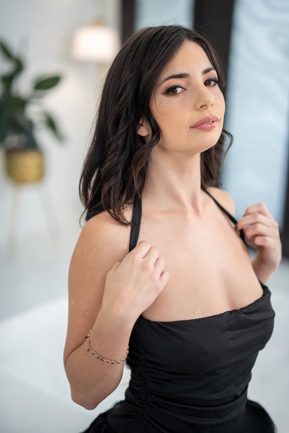Sexy brunette Asteria Jade has sex with her man friend on a sofa