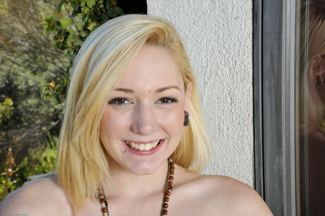 Rylie Richman seductively strips to absolute bare skin alone on a sunny patio - 5