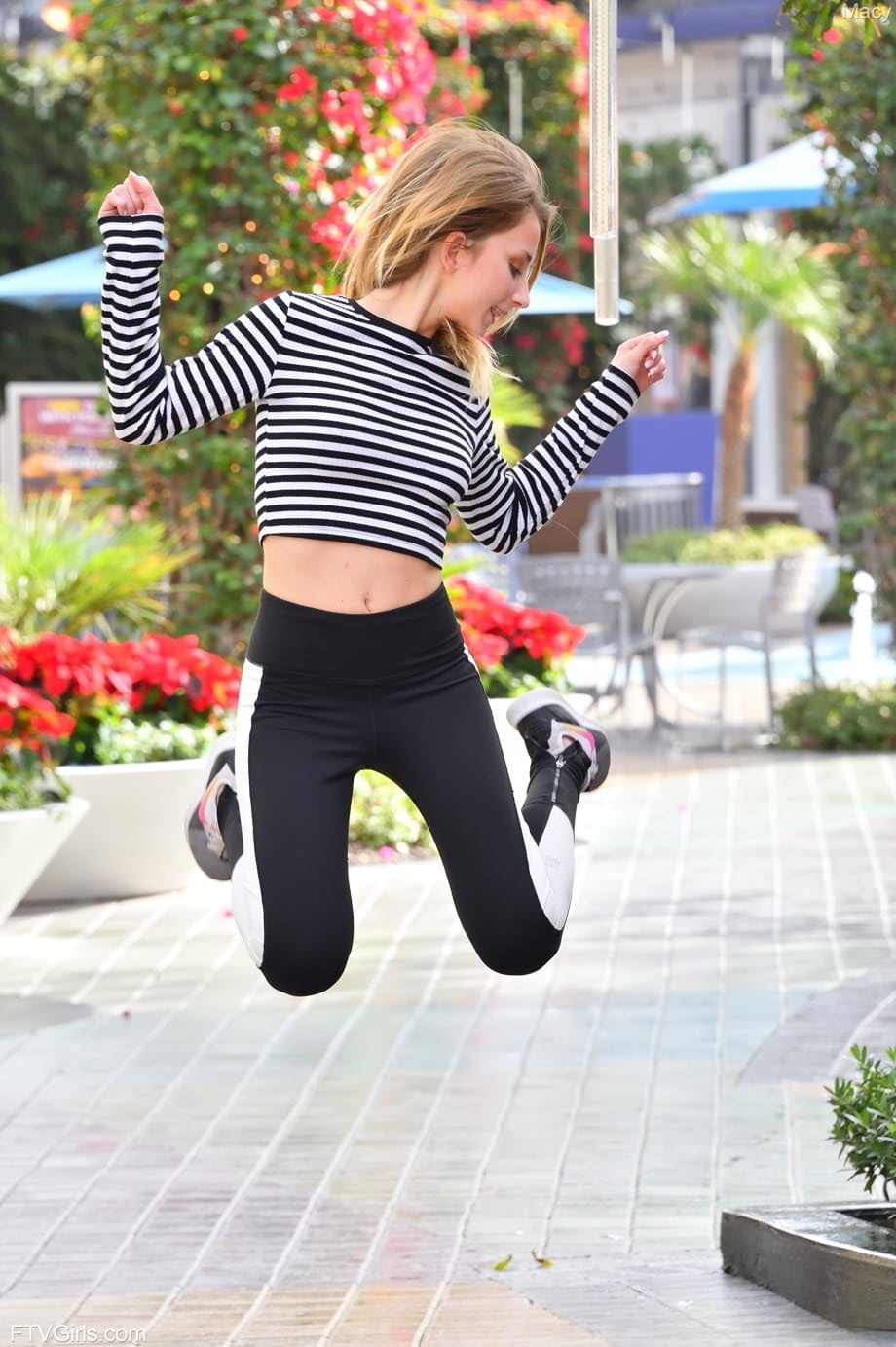 Sexy young Macy Meadows flashes her natural tits daringly in public - 8
